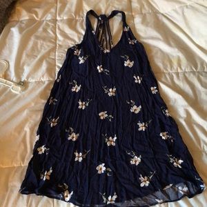 Cute, never worn summer dress with back design